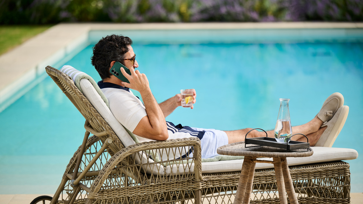 man by pool